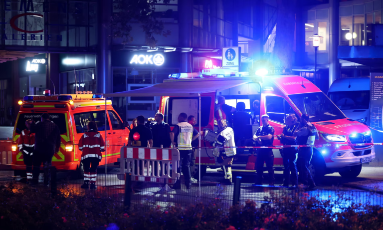 Germany mass stabbing: police hunt suspect after three killed at festival in Solingen