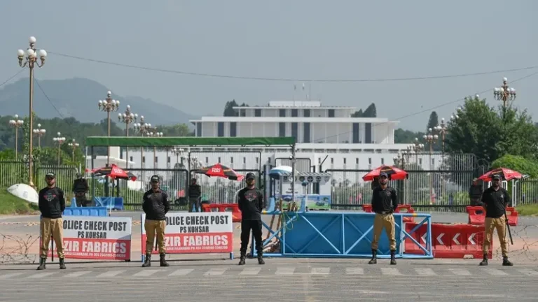 Pakistan seals off its capital Islamabad ahead of a planned rally by Imran Khan supporters